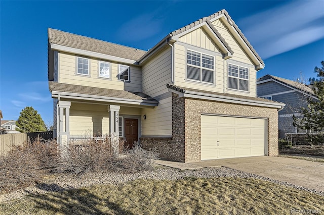 craftsman house featuring fence, board and batten siding, concrete driveway, a garage, and brick siding