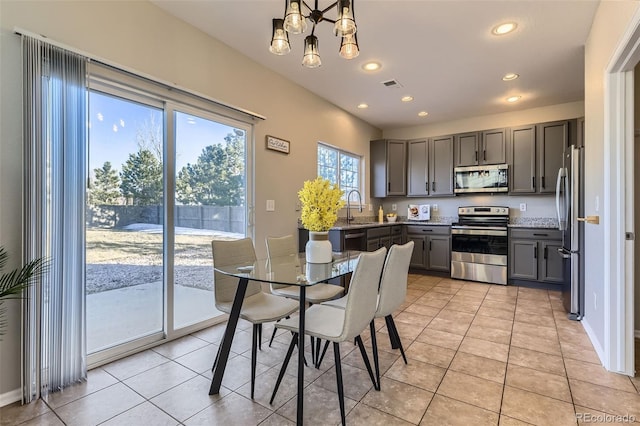 dining space featuring recessed lighting, visible vents, baseboards, and light tile patterned floors