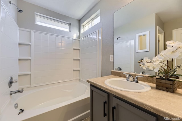 bathroom with tub / shower combination and vanity