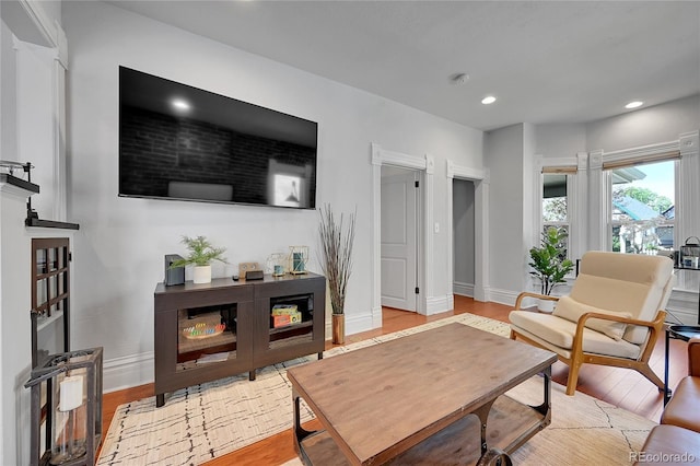 1208 S Pennsylvania St, Denver, CO 80210 - living area with recessed lighting, baseboards, and light wood-style floors