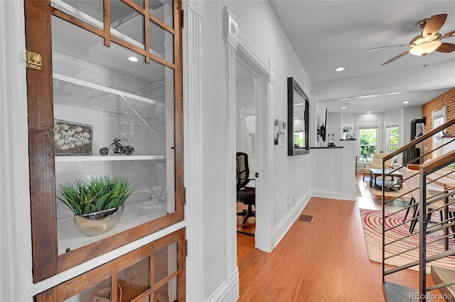 1208 S Pennsylvania St, Denver, CO 80210 - hallway featuring wood finished floors, recessed lighting, and baseboards