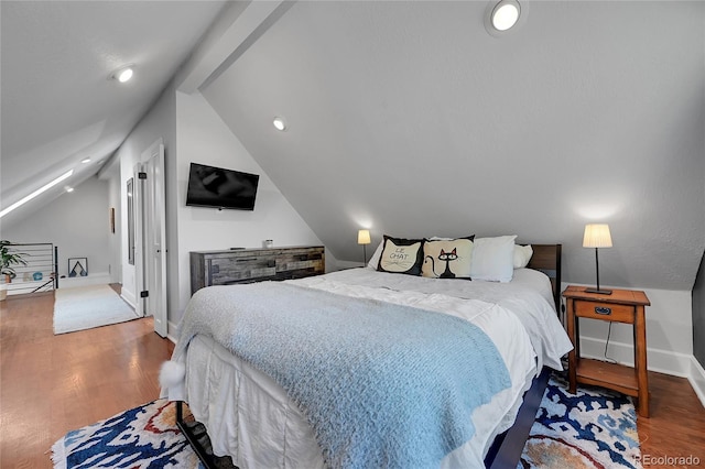 1208 S Pennsylvania St, Denver, CO 80210 - bedroom with vaulted ceiling, wood finished floors, baseboards, and recessed lighting