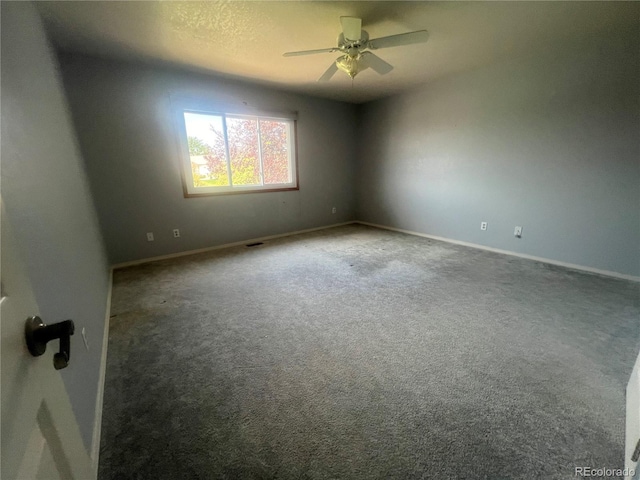 carpeted empty room with ceiling fan