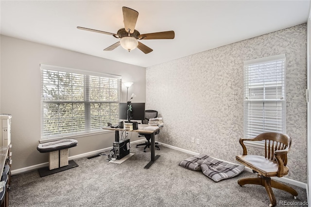 carpeted office with ceiling fan