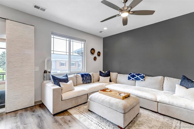837 E 98th Ave Unit 403, Thornton, CO 80229 - living room with plenty of natural light, light wood finished floors, a ceiling fan, and recessed lighting