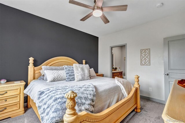 837 E 98th Ave Unit 403, Thornton, CO 80229 - bedroom with light carpet, a ceiling fan, and baseboards