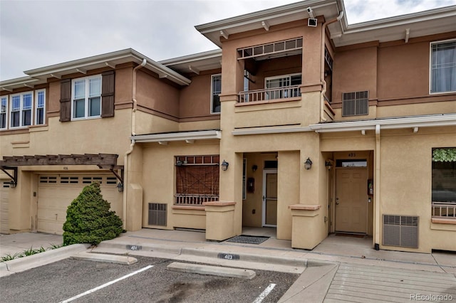 837 E 98th Ave Unit 403, Thornton, CO 80229 - view of property featuring uncovered parking