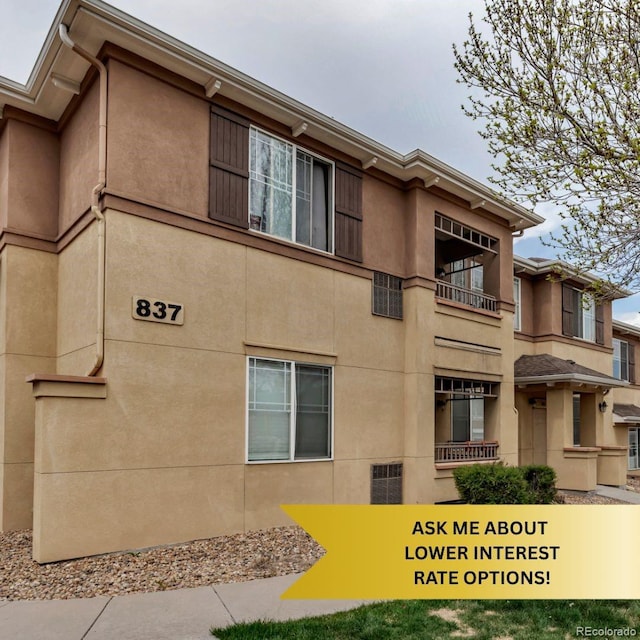 837 E 98th Ave Unit 403, Thornton, CO 80229 - view of home's exterior with stucco siding