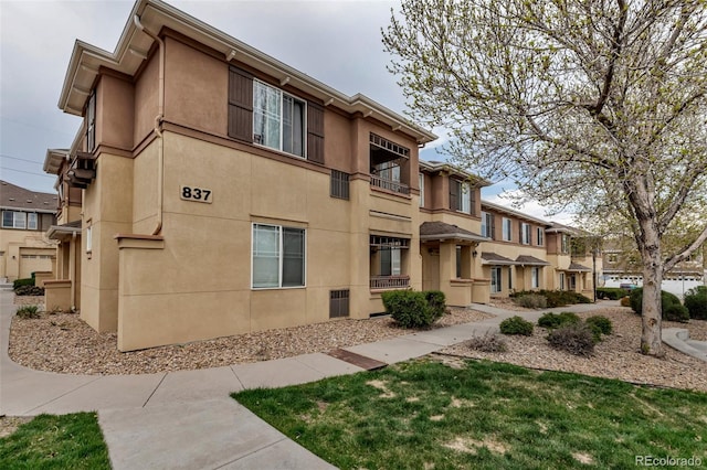 837 E 98th Ave Unit 403, Thornton, CO 80229 - view of property with a residential view