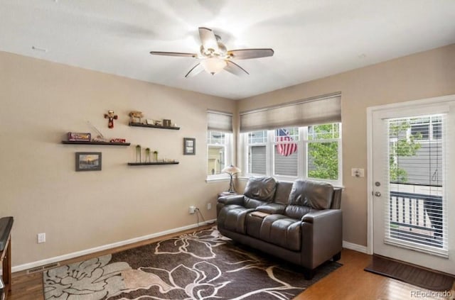 569 Jackson St, Lafayette, CO 80026 - living room with ceiling fan and wood finished floors