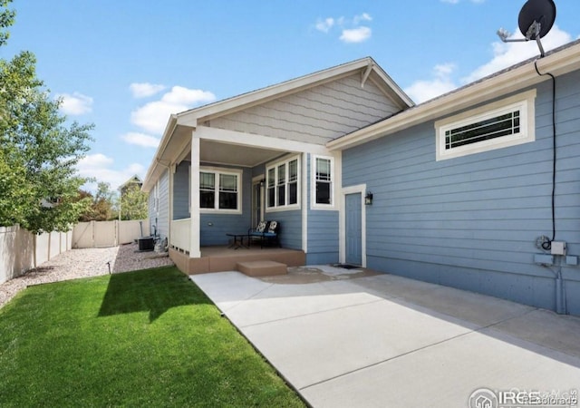 569 Jackson St, Lafayette, CO 80026 - rear view of house featuring a patio area