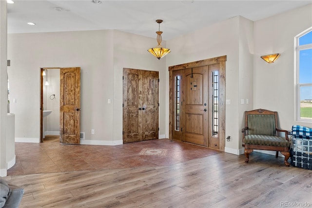 entrance foyer featuring hardwood / wood-style floors