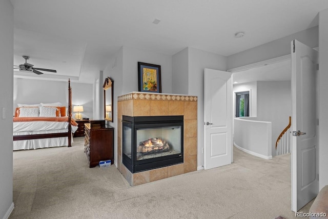 10837 Fox Sedge Way, Highlands Ranch, CO 80126 - bedroom featuring carpet and a fireplace