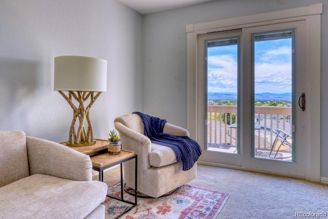 10837 Fox Sedge Way, Highlands Ranch, CO 80126 - living area with carpet flooring and baseboards
