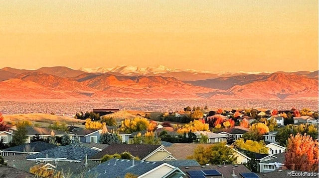 10837 Fox Sedge Way, Highlands Ranch, CO 80126 - mountain view with nearby suburban area