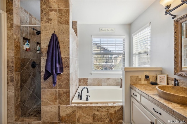 bathroom with plus walk in shower and vanity