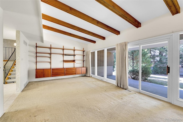 interior space with visible vents, vaulted ceiling with beams, stairs, and carpet