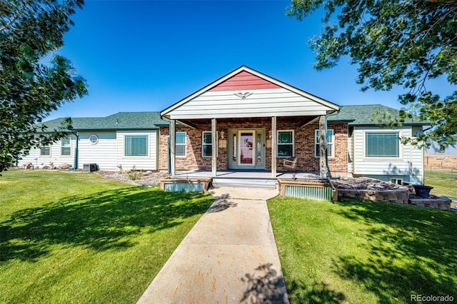 view of front facade with covered porch, a front lawn, and central air condition unit