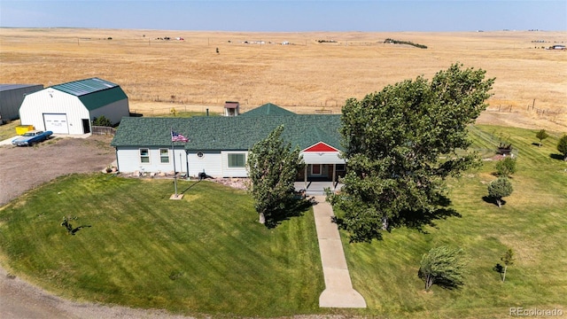 birds eye view of property featuring a rural view