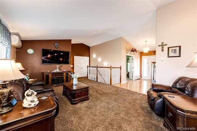 carpeted living room with vaulted ceiling and a wall unit AC