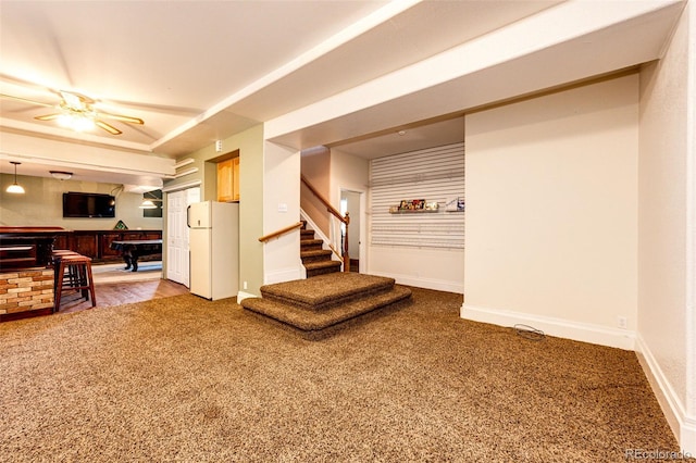 interior space featuring carpet, ceiling fan, billiards, white fridge, and bar