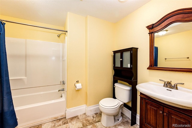 full bathroom with vanity, toilet, and shower / bath combo with shower curtain