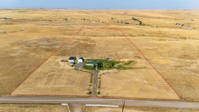 birds eye view of property featuring a rural view