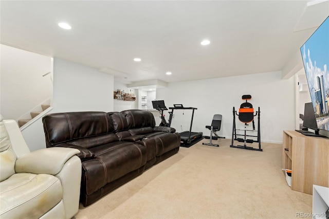 living area featuring stairs, recessed lighting, and light carpet