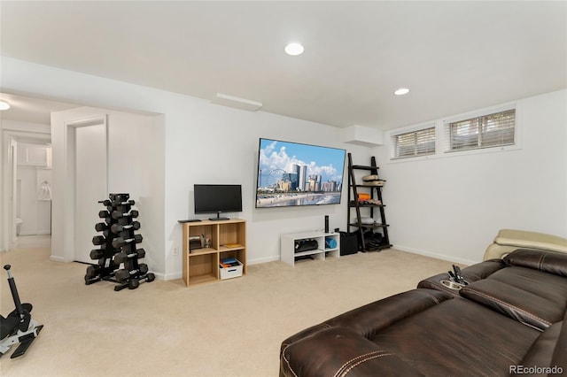 living area featuring baseboards, carpet flooring, and recessed lighting