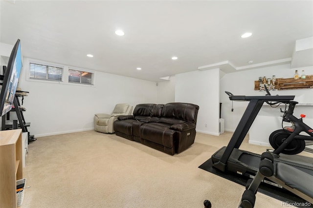 workout area with baseboards, recessed lighting, and light carpet