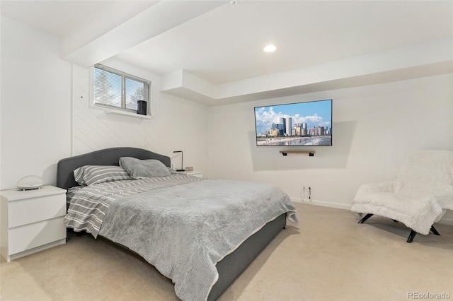 bedroom with light colored carpet, recessed lighting, and baseboards