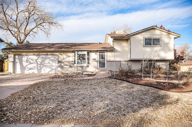 split level home with a garage