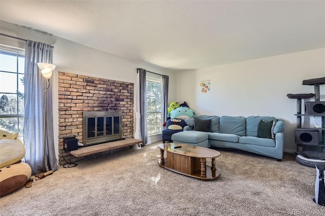 living room with a fireplace and carpet flooring