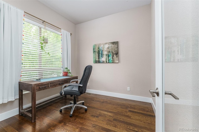 2868 Kingston St, Denver, CO 80238 - home office with dark wood finished floors and baseboards