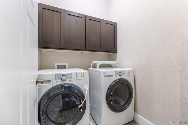 2868 Kingston St, Denver, CO 80238 - laundry area with independent washer and dryer and cabinet space