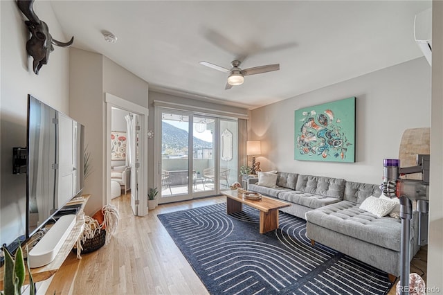 114 Old Stage Rd Unit D, Salida, CO 81201 - living area featuring a ceiling fan and wood finished floors