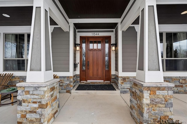 entrance to property with a porch