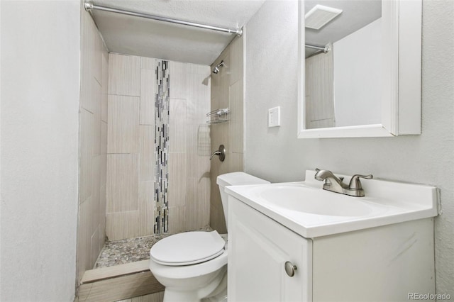2518 S Dawson Way, Aurora, CO 80014 - bathroom with vanity and tiled shower