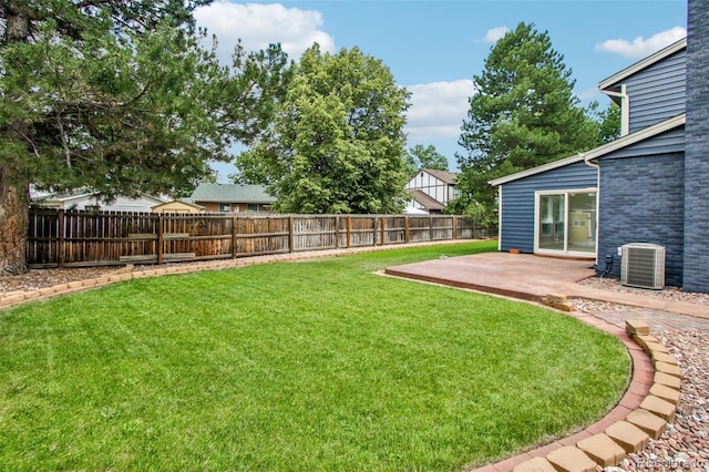 2518 S Dawson Way, Aurora, CO 80014 - fenced backyard featuring a patio
