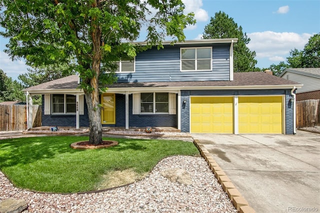 2518 S Dawson Way, Aurora, CO 80014 - traditional-style house with driveway, a porch, and brick siding