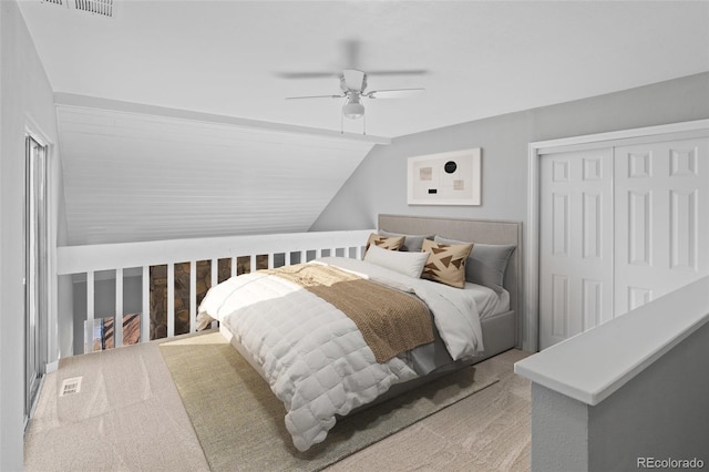 13633 E Yale Ave Unit B, Aurora, CO 80015 - carpeted bedroom featuring a closet, lofted ceiling, and a ceiling fan