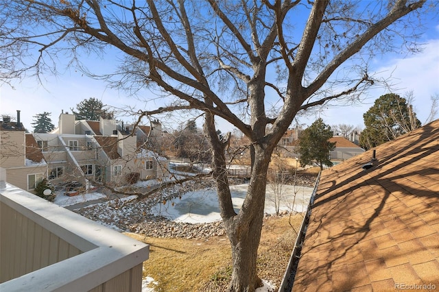 13633 E Yale Ave Unit B, Aurora, CO 80015 - yard covered in snow with a residential view