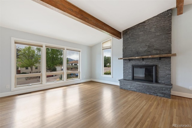 813 Panorama Dr, Colorado Springs, CO 80904 - unfurnished living room featuring wood finished floors, baseboards, and a fireplace