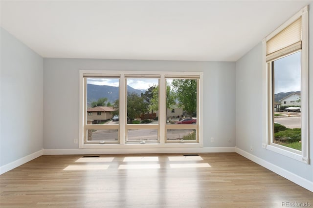 813 Panorama Dr, Colorado Springs, CO 80904 - empty room with light wood-style floors and baseboards