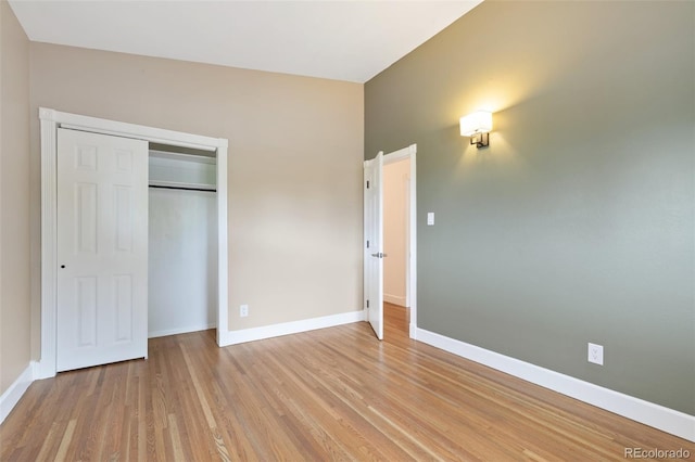 813 Panorama Dr, Colorado Springs, CO 80904 - unfurnished bedroom with light wood-type flooring, baseboards, and a closet