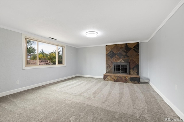 813 Panorama Dr, Colorado Springs, CO 80904 - unfurnished living room with a stone fireplace, carpet floors, crown molding, and baseboards