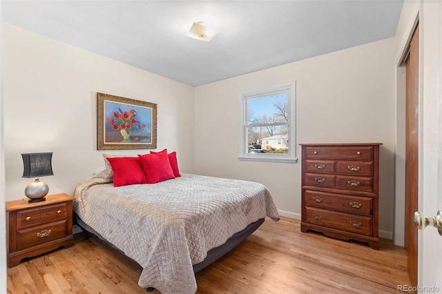 bedroom featuring light wood-type flooring