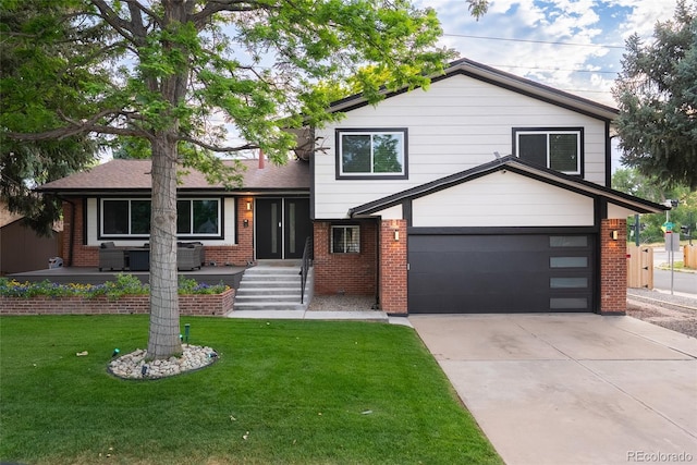 7302 E Bates Dr, Denver, CO 80231 - split level home with brick siding, concrete driveway, and a front lawn