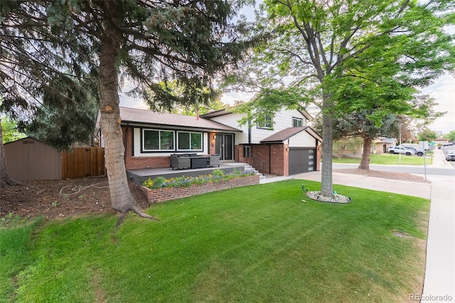 7302 E Bates Dr, Denver, CO 80231 - tri-level home featuring brick siding, driveway, and a shed