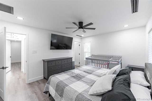 7302 E Bates Dr, Denver, CO 80231 - bedroom featuring light wood finished floors, ceiling fan, and recessed lighting